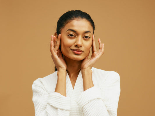 woman model holding her face